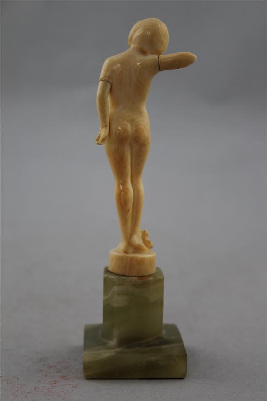Attributed to Ferdinand Preiss, An Art Deco carved ivory figure of a young girl, 6in.
